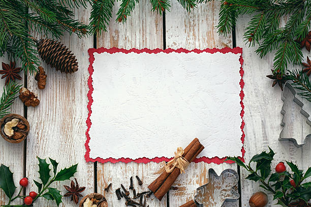 istock Christmas wooden background with spices and snow - copy space 619401190