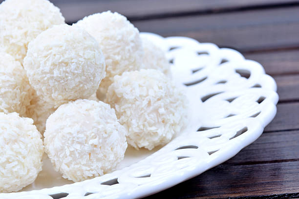 istock Plate with coconut cookies on table 619404722