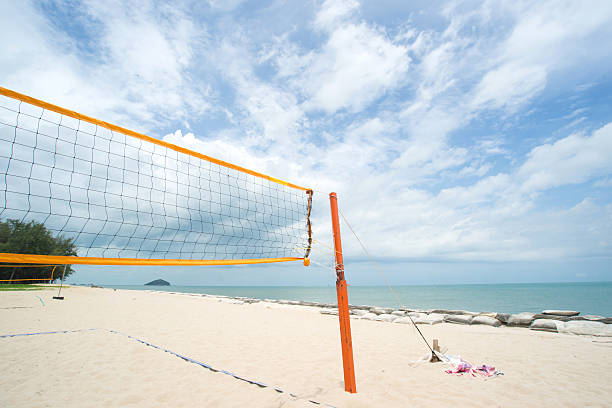 istock Beach Volleyball net on the beach with blue sky 619407150