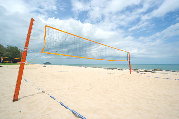 istock Beach Volleyball net on the beach with blue sky 619407198