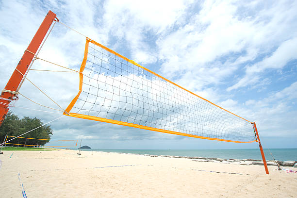 istock Beach Volleyball net on the beach with blue sky 619407228