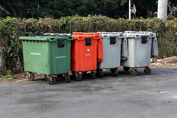 istock City trash cans (garbage bin) with wheels 619411244