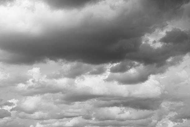 istock Gray clouds flying over horizon, storm. 619412446