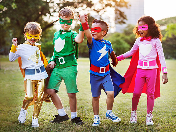 istock Superheroes Kids Friends Playing Togetherness Fun Concept 619413310