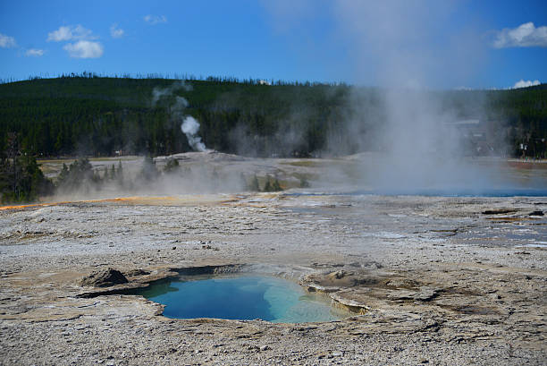 istock Hot geyser pool in Old Faithful area 619497448