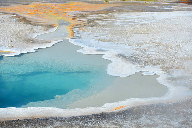 istock Hot geyser pool in Old Faithful area 619497554