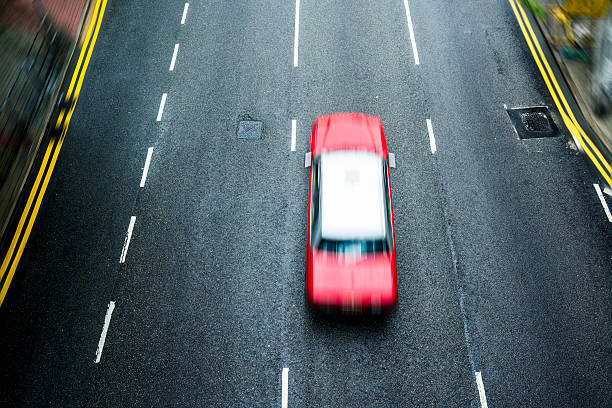 istock overhead view of taxi on highway 619498364