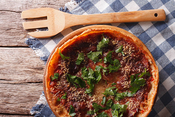 istock Chicago deep dish pizza close-up. horizontal top view 619501744