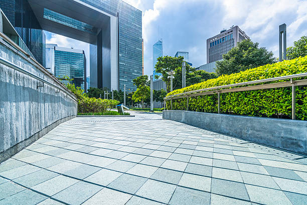 istock modern skyscrapers standing against blue sky 619503458