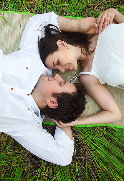 istock Couple on the summer medow 619505500