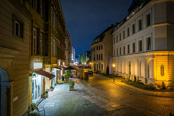 istock Old city street by night 619506728
