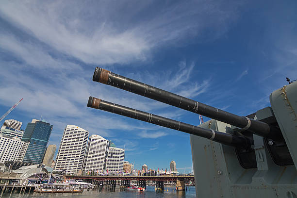 Sydney, Australia - April 21, 2016: Closeup of Australian Daring-class destroyer HMAS Vampire ship docking at Darling Harbour with Pyrmont Bridge in background, Sydney, Australia.