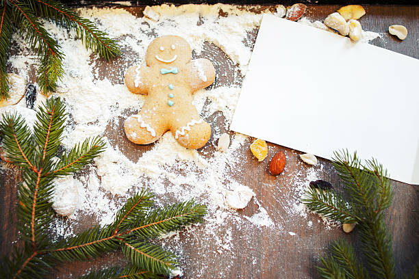istock Blank greeting card with gingerbread man on table 619509158