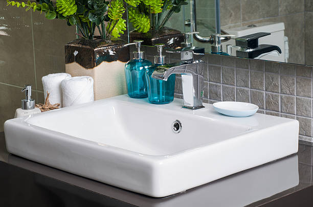 istock Bathroom interior with sink and faucet 619509928