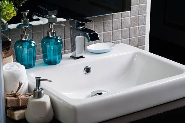 istock Bathroom interior with sink and faucet 619510056