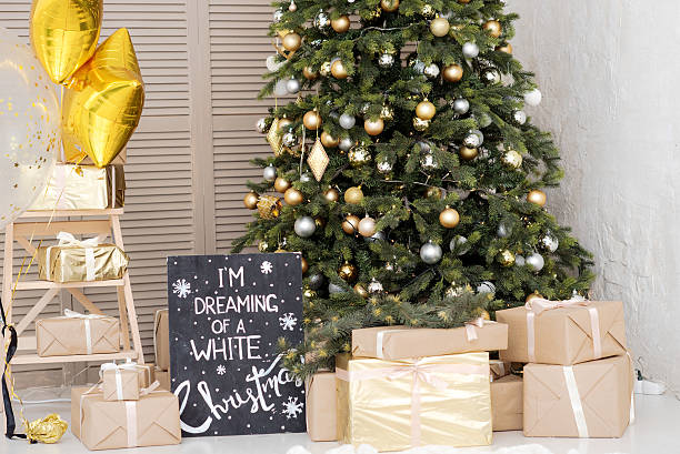 istock Many boxes with a christas gifts near the tree 619510488