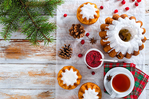 istock delicious  rum cakes with sugar glaze and cranberry 619511058