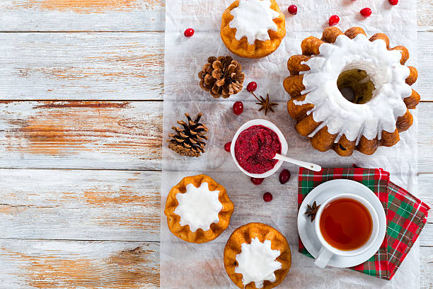 istock delicious  rum cakes with sugar glaze and cranberry 619511168