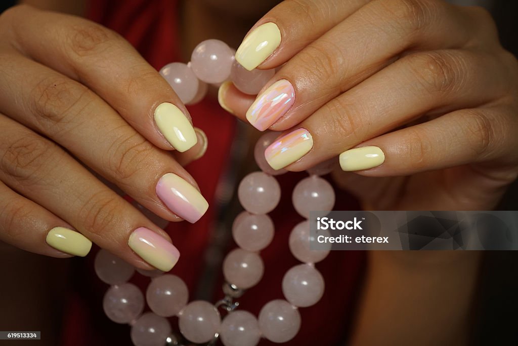 Awesome nails and beautiful clean manicure. Awesome nails and beautiful clean manicure. Nails are natural. Manicure is made using nails drill machine. Adult Stock Photo