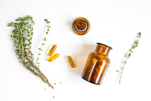 istock natural medicine - herbs top view 619516008