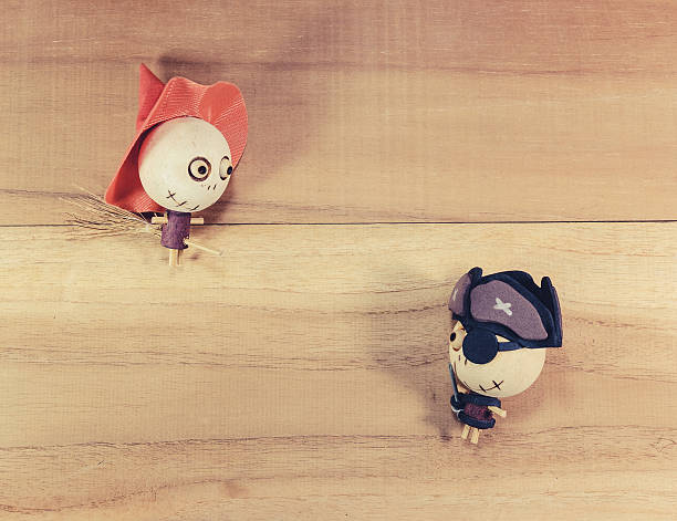 dolls, witches and pirates on the wooden floor. - witchs imagens e fotografias de stock