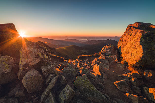 istock Rocky Mountain Peak. Mountain Landscape at Sunset. 619518728