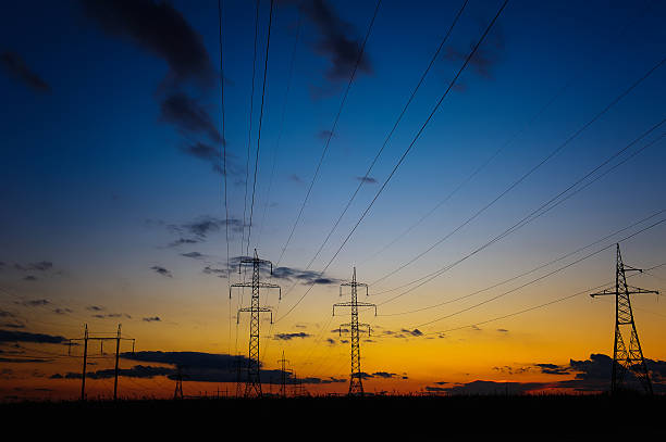 istock Silhouette of high voltage power lines 619518828