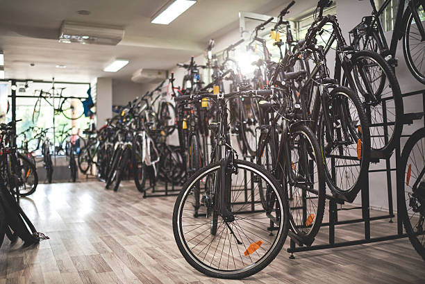 Bicycles inside the store Bicycles arranged inside the bicycle store. bicycle shop stock pictures, royalty-free photos & images