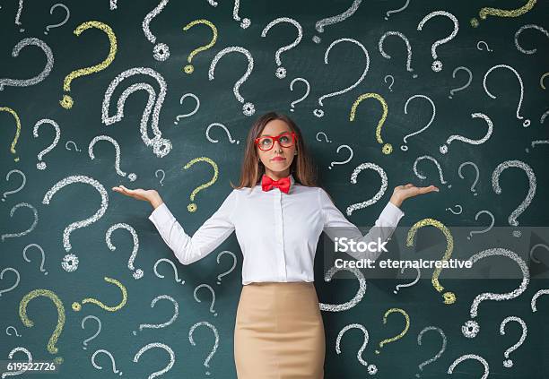 Businesswoman With Question Mark Stock Photo - Download Image Now - Question Mark, Asking, Contemplation