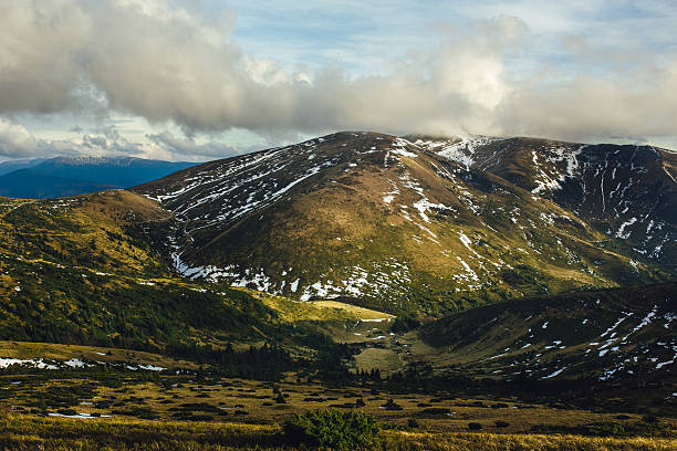 istock Little snow-capped mountains 619523970