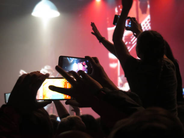 istock blurred Crowd during entertainment concert fun zone people 619525382