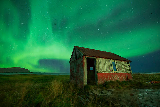 istock Aurora and Abandoned Hut, Lofoten, Norway 619526898