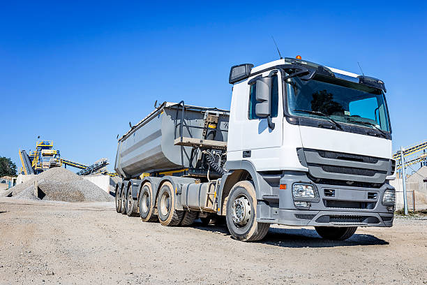 istock Large dump truck in stone mine 619528546