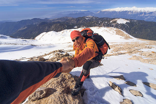 istock Winter hiking in the mountains with a backpack. 619529742
