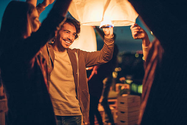 istock Releasing a Chinese lantern 619530818