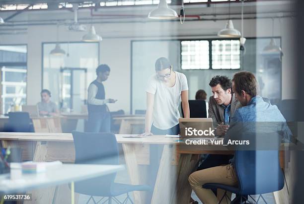 Putting There Heads Together On The Project Stock Photo - Download Image Now - Office, Strategy, Meeting
