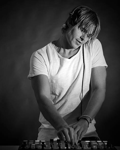 istock Dj mixing the track 619534758