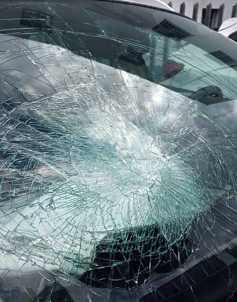 istock Cracked windshield of a car that was involved in a 619535278