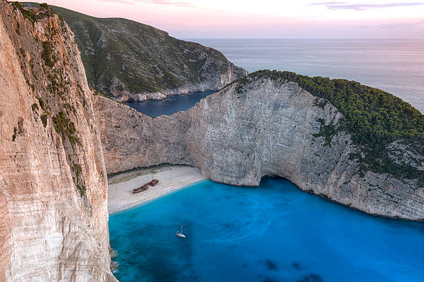 istock Amazing Navagio beach at sunset, Zakynthos 619536558