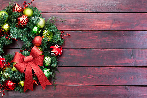istock Elegant Christmas wreath with baubles and bow 619537326