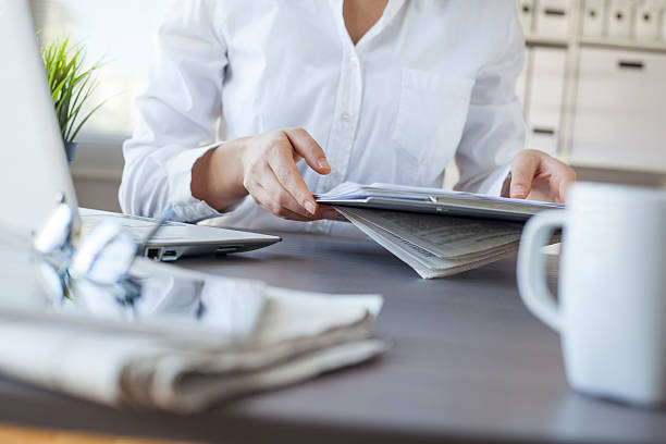 istock Businesswoman working in office 619538340