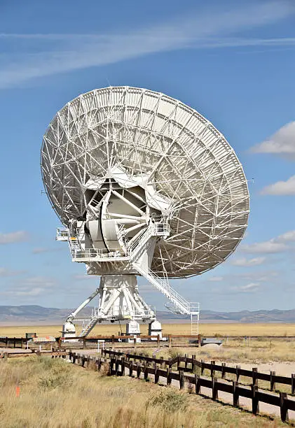 Giant radio telescope dish part of an array in the New Mexico desert