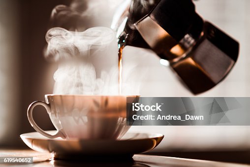 istock Morning Coffee Pour in Coffee Cup Espresso Maker with Steam 619540652