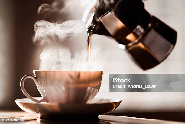 Morning Coffee Pour In Coffee Cup Espresso Maker With Steam Stock Photo - Download Image Now