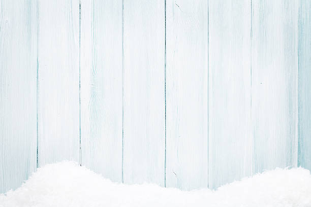 istock Blue wood texture with snow 619540686