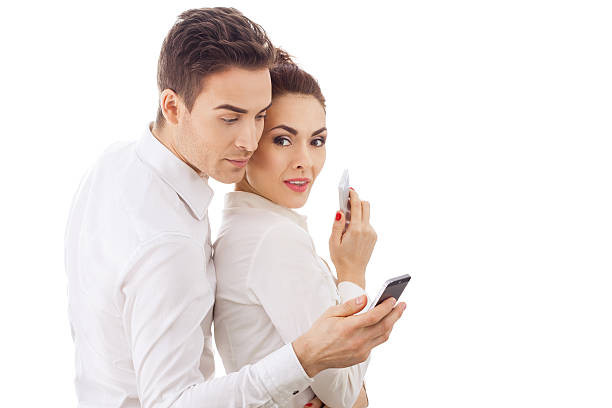 istock Couple With Their Phones 619541180
