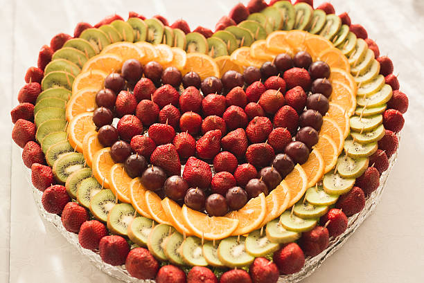 Authentic buffet, assorted fresh fruits, berries and citrus. Preparation for