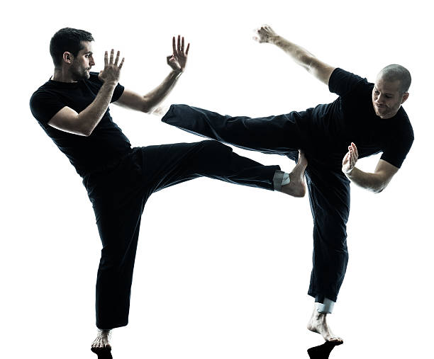 istock men krav maga fighters fighting isolated 619631958