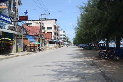 Cha-Am, Thailand - October 11, 2016: Coastal road at Cha-Am, a resort town along the Gulf of Thailand near Hua Hin, and known among Thai families for being a weekend destination within driving distance from the capital. It lies 173 km south of Bangkok.