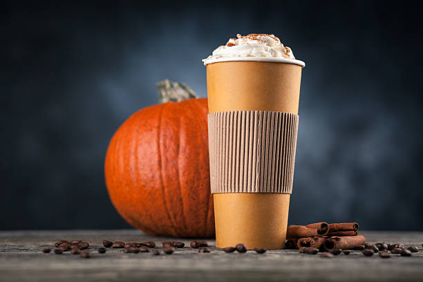 istock Pumpkin spice latte in a paper cup 619634536